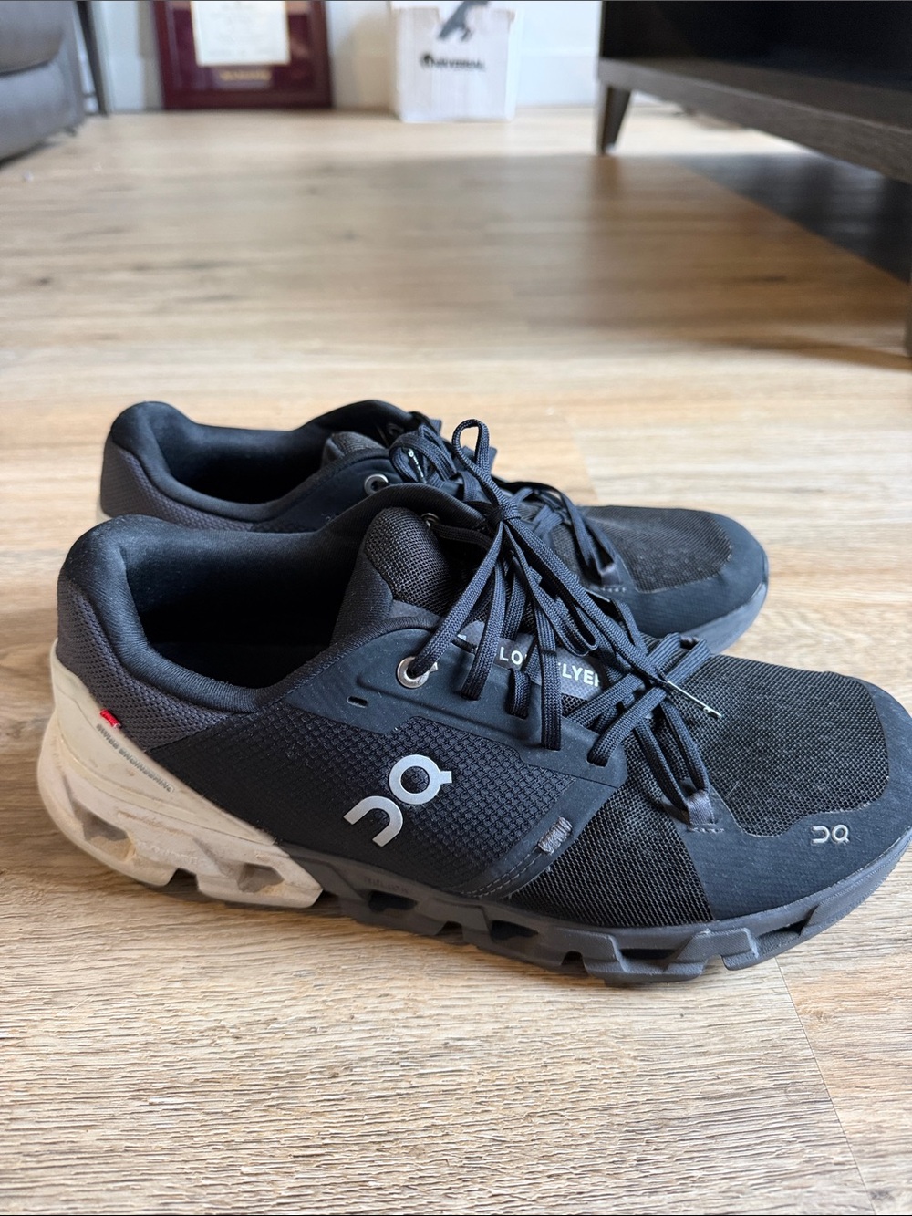 On Running Men's Cloudace Black and White Athletic Shoes